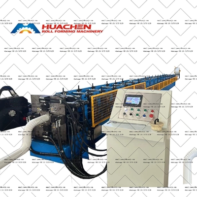 Macchina di formazione automatica di rotoli a scarico