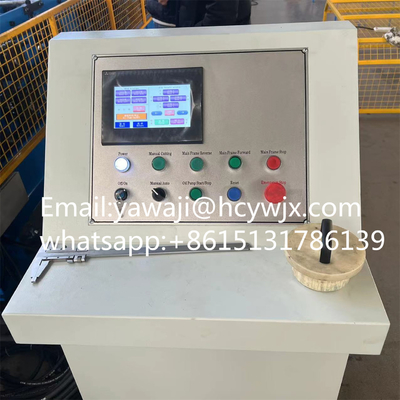 Macchina di formazione automatica di rotoli a scarico