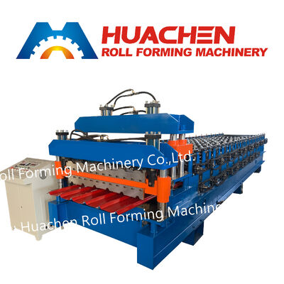 Macchina per la formazione di fogli di pannelli metallici a doppio strato per tetti e rivestimenti